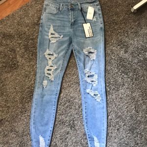 light washed ripped skinny jeans